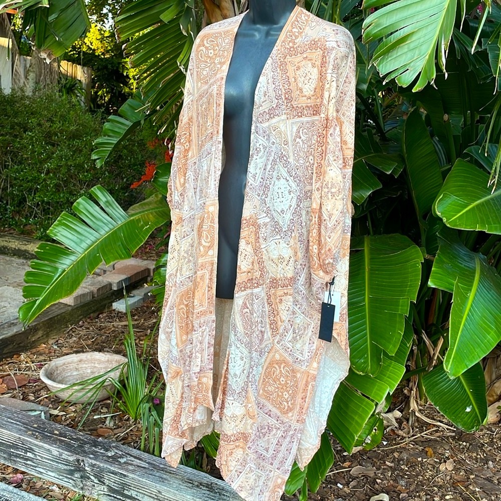 Black tape, kimono, duster or swim cover-up